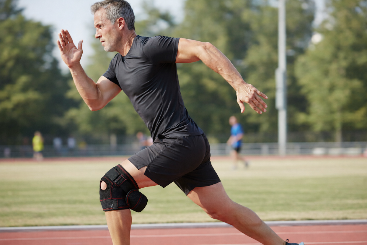Runner wearing the GAPR brace during active movement